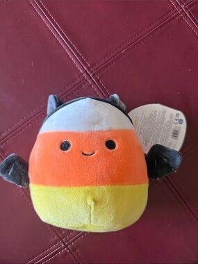 Squishmallows Delie Candy Corn Plush in Orange, Yellow, White with Gray Wings